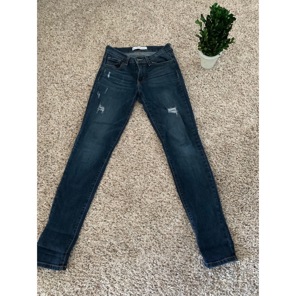Flying Monkey Mid Rise Skinny Jeans